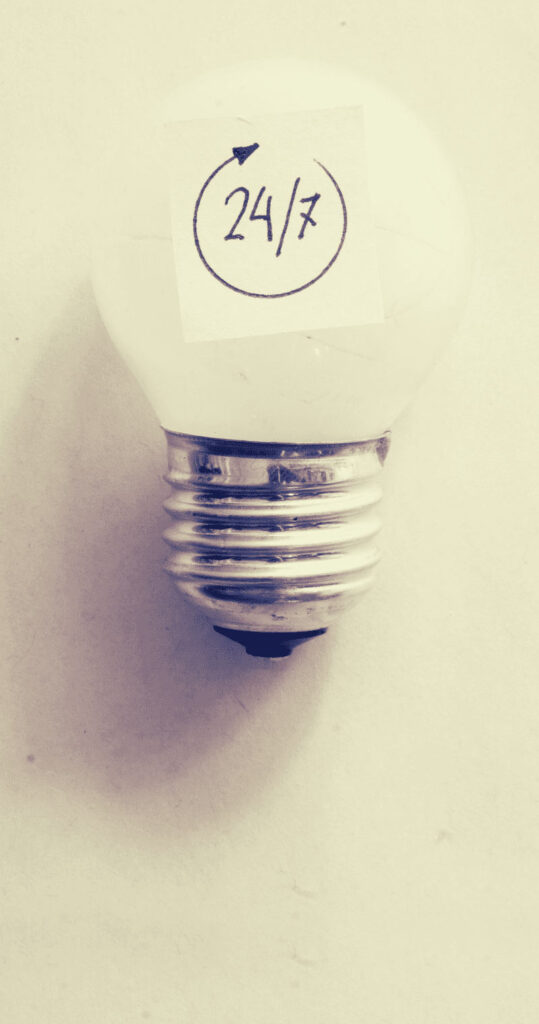 lightbulb with note