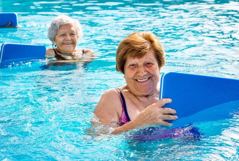 two people swimming