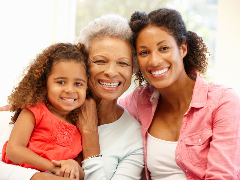 senior woman and her daughter and granddaughter
